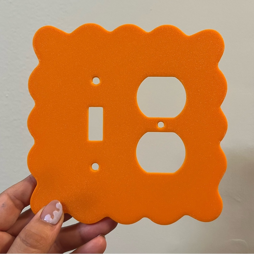 Wiggle switch plate cover